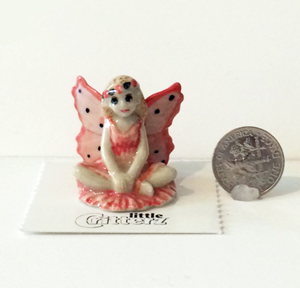 Rose Fairy Little Critterz with dime