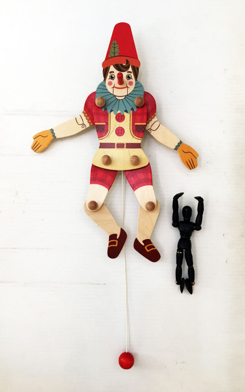 pinocchio wood pull puppet and logo
