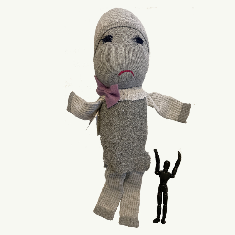 Handcrafted Frowny Doll with Logo