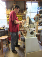 Arthur McVicar at lathe